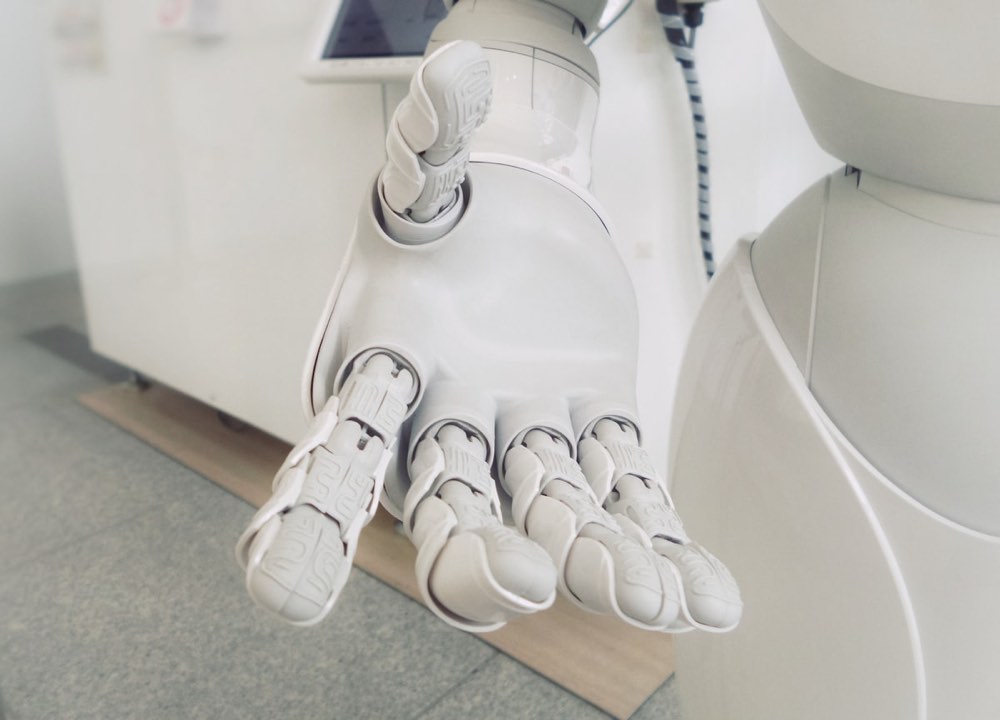 Humanoid robot representing Tesla Optimus production ramp at the Fremont factory