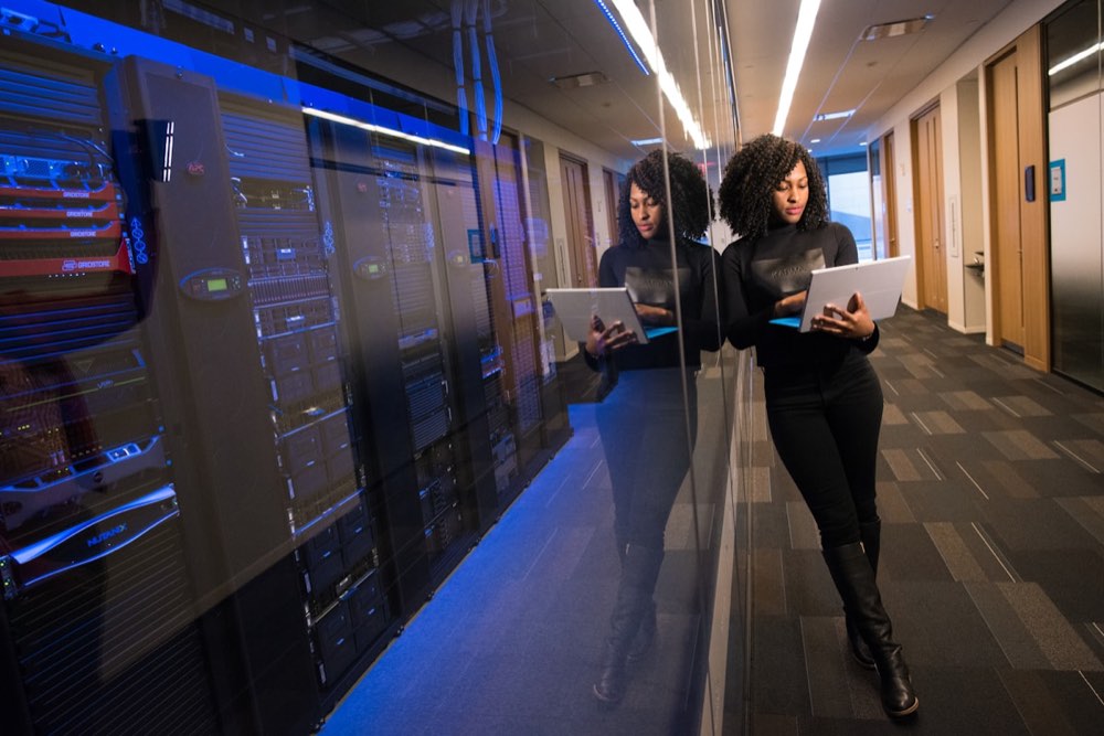Startup team collaborating in a modern office representing the AI venture funding boom